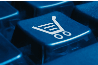 close em ícone carrinho de compra em teclado azul